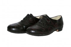 black women's oxford with red floral stitching